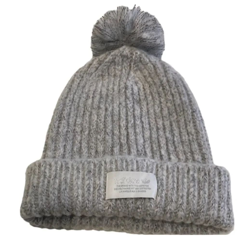 Gray Adidas beanie with POM on top